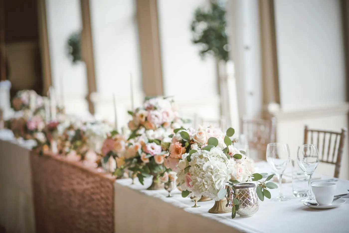 Catered dinner tables set for guests