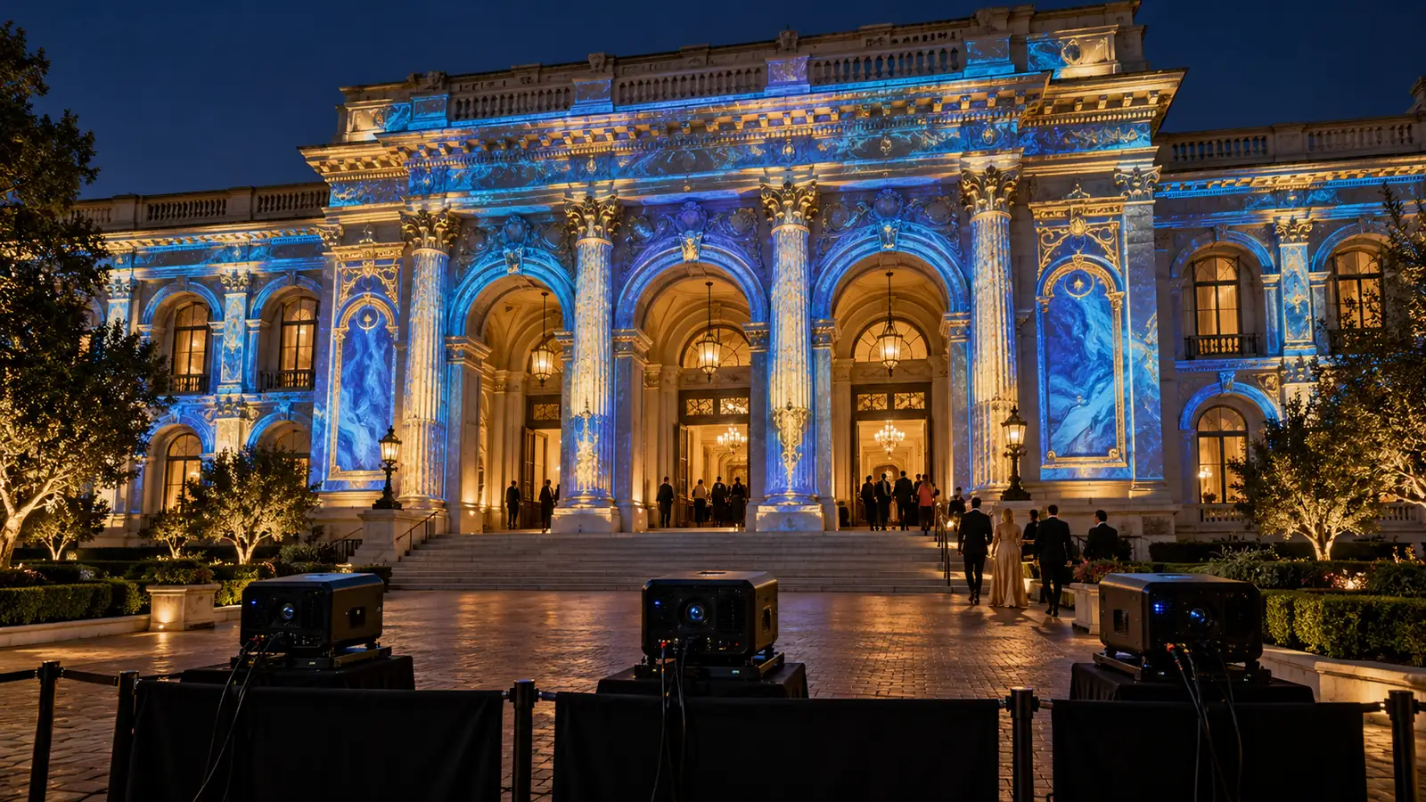 Architectural mapping visualization with blue and gold content aligned to a large building facade.